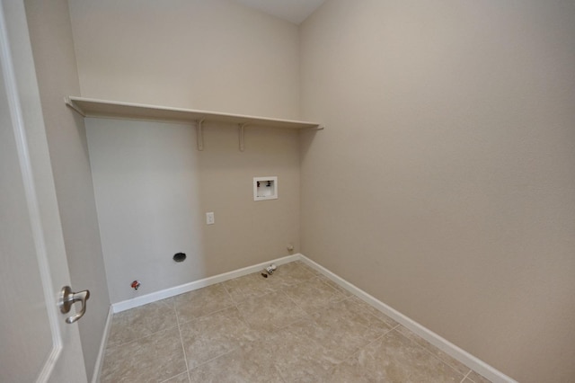 laundry room with hookup for a gas dryer and hookup for a washing machine