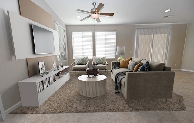 tiled living room with ceiling fan