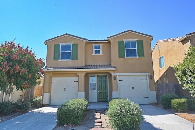 view of front of home with a garage