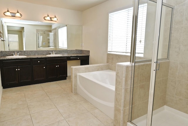 bathroom with vanity, separate shower and tub, and tile patterned flooring