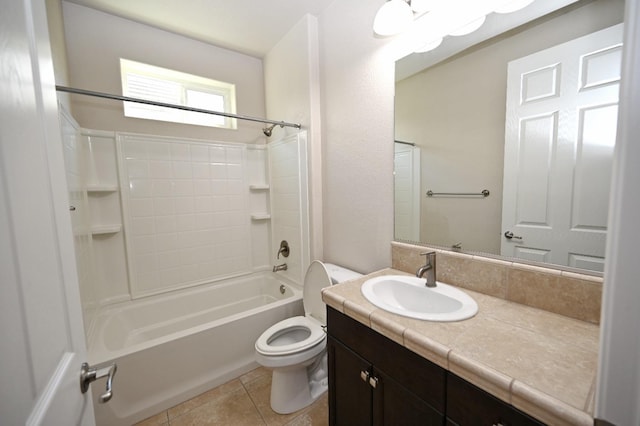 full bathroom featuring toilet, bathing tub / shower combination, tile patterned floors, and vanity