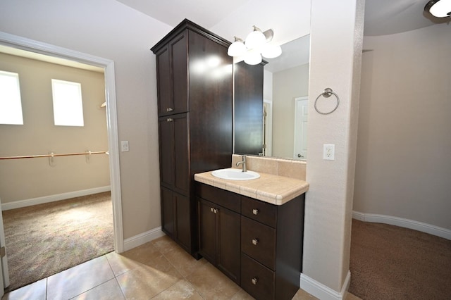 bathroom with vanity and tile patterned flooring