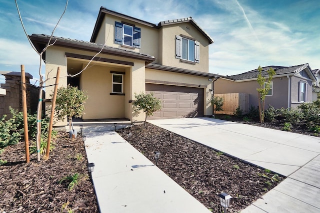 view of front of property with a garage