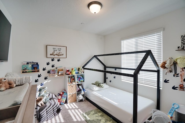 bedroom featuring carpet