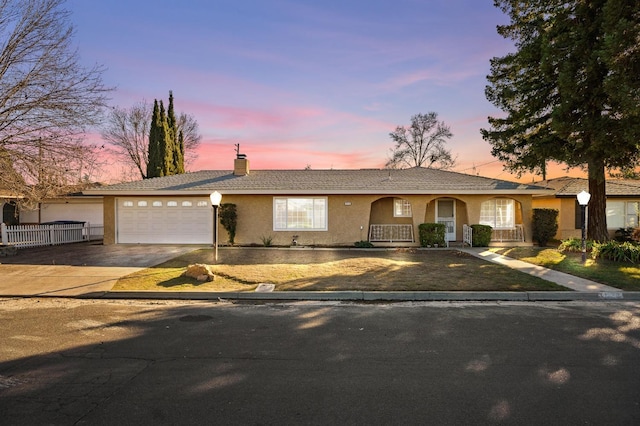 single story home with a garage