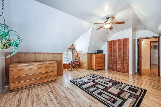 bonus room featuring ceiling fan, lofted ceiling, and hardwood / wood-style floors