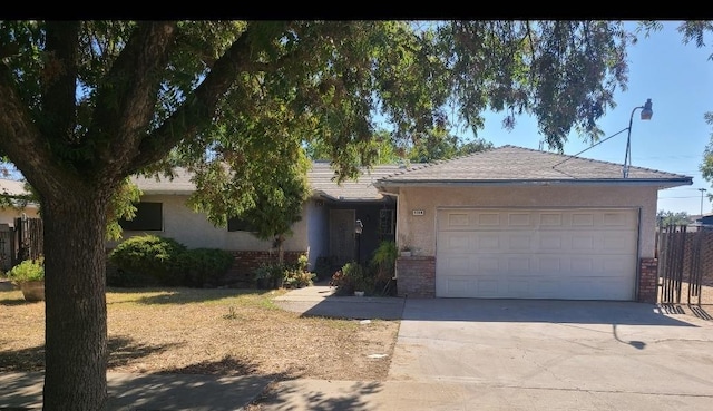 single story home featuring a garage