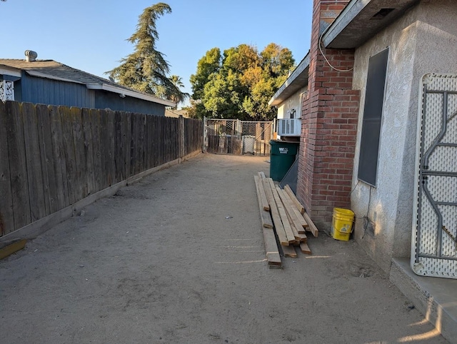 view of side of property with a patio area