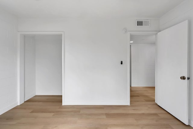 unfurnished bedroom featuring light hardwood / wood-style flooring