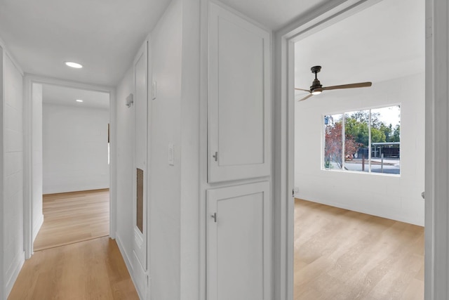 hallway featuring light hardwood / wood-style flooring