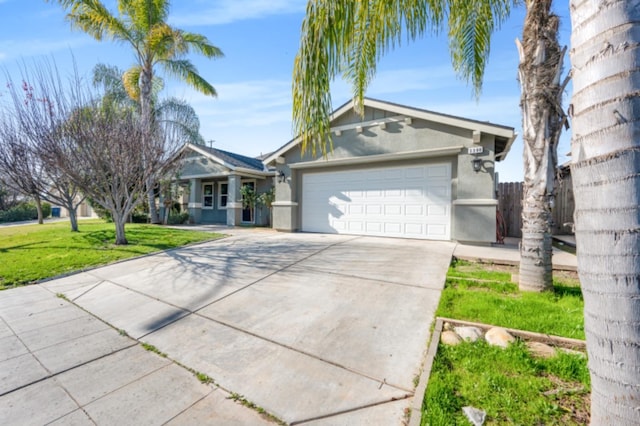 ranch-style house featuring a garage and a front yard