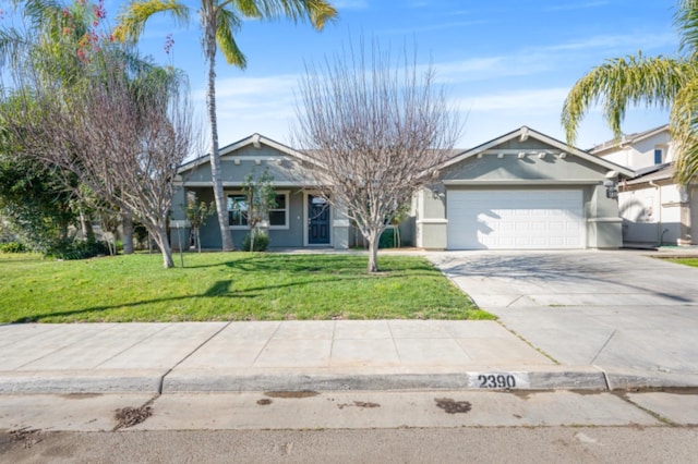 view of front facade with a front lawn and a garage