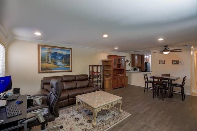 office space featuring ceiling fan, dark hardwood / wood-style flooring, and ornamental molding