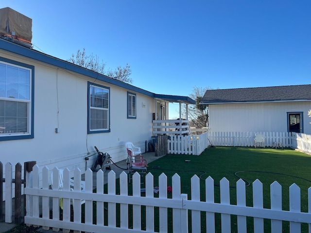 exterior space featuring a fenced backyard