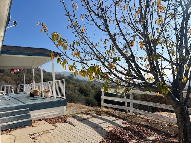 exterior space featuring a patio area and fence
