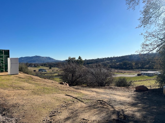 view of mountain feature featuring a rural view