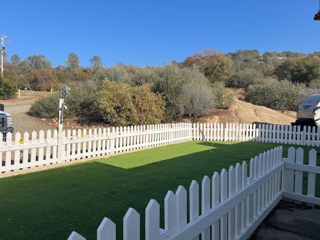 view of yard featuring fence