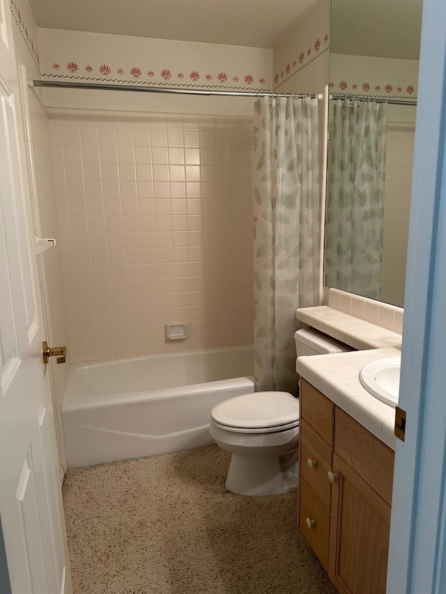 full bathroom featuring toilet, vanity, and shower / bath combo with shower curtain