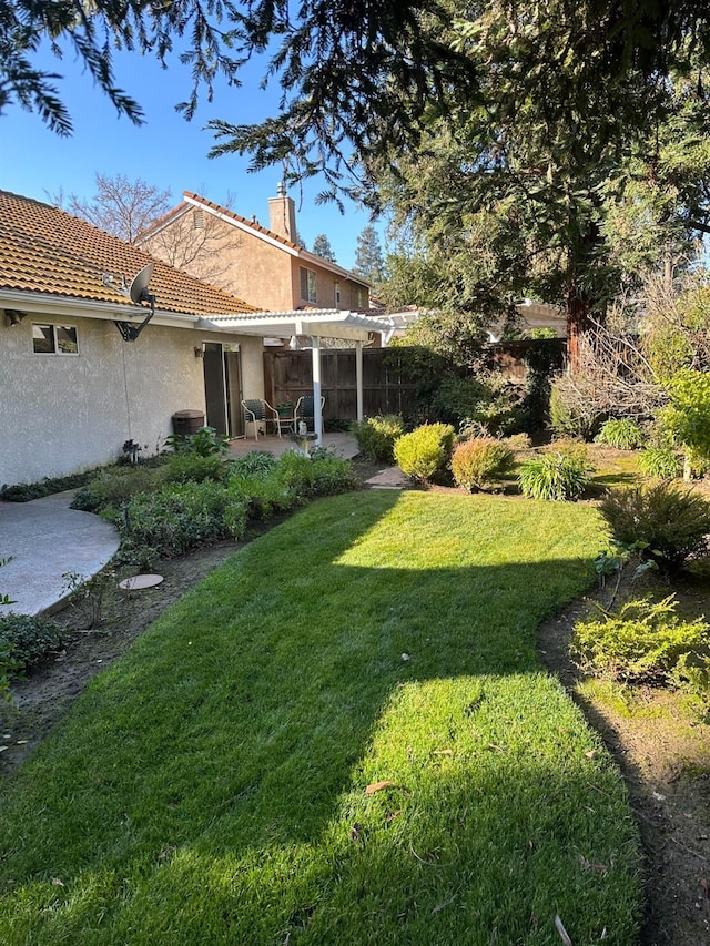 view of yard featuring a pergola and a patio