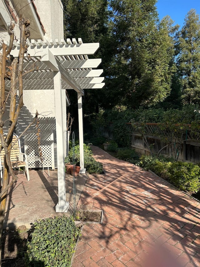 view of patio featuring a pergola