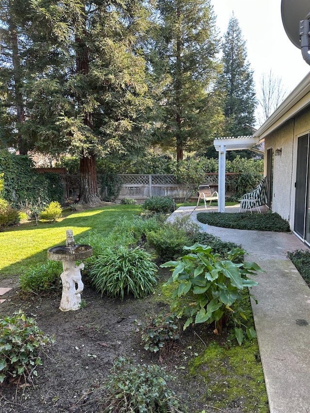 view of yard with a pergola