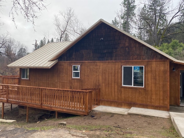 view of home's exterior with a deck