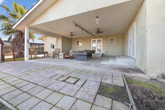 view of patio / terrace featuring ceiling fan