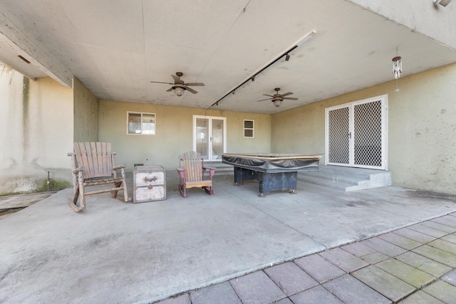 view of patio with ceiling fan