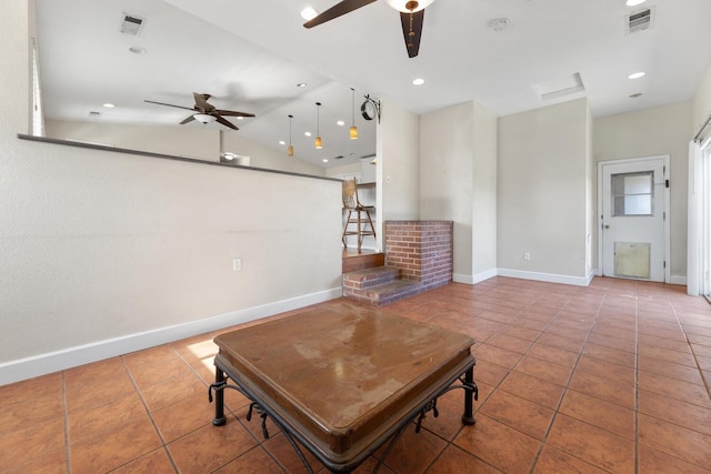 tiled living room featuring vaulted ceiling and ceiling fan