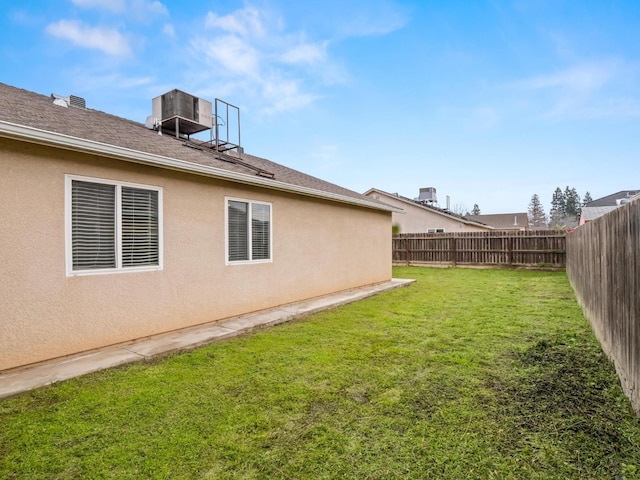 view of yard featuring central AC unit