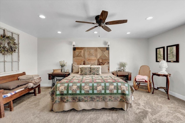 carpeted bedroom with ceiling fan