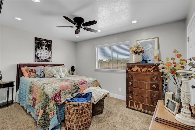 bedroom with ceiling fan and carpet floors