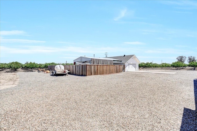 view of yard featuring a garage