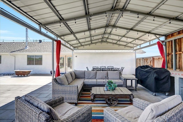 view of patio with an outdoor hangout area and grilling area