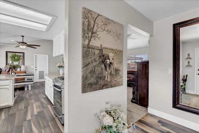 corridor featuring dark hardwood / wood-style floors