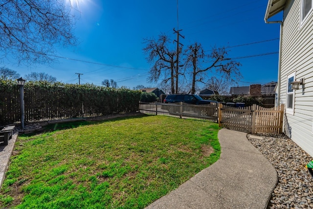 view of yard featuring a fenced backyard