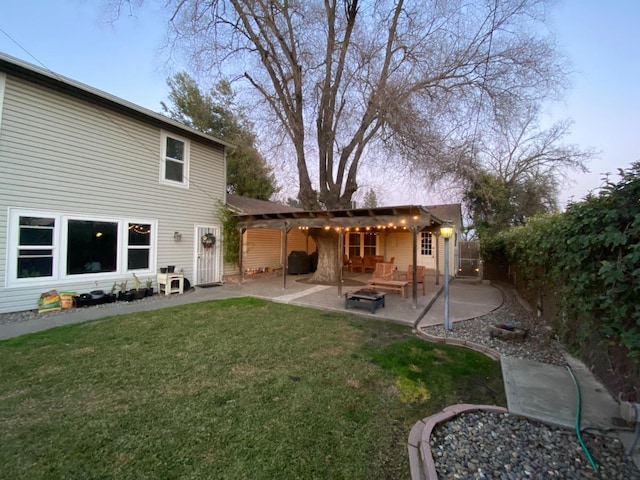 back of house with fence, a pergola, a lawn, and a patio