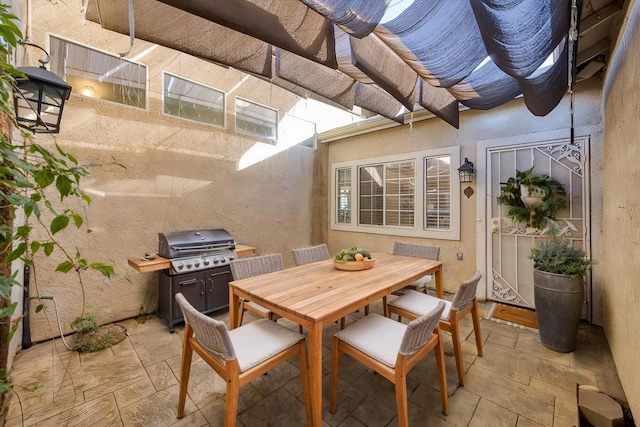 view of patio with a grill