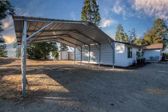 view of parking / parking lot featuring a carport