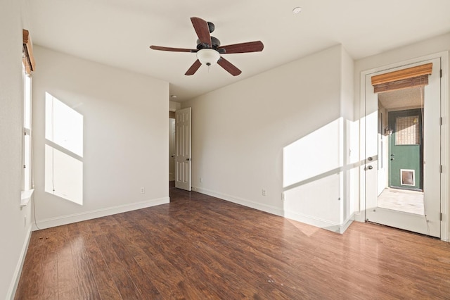 unfurnished room with ceiling fan and hardwood / wood-style flooring