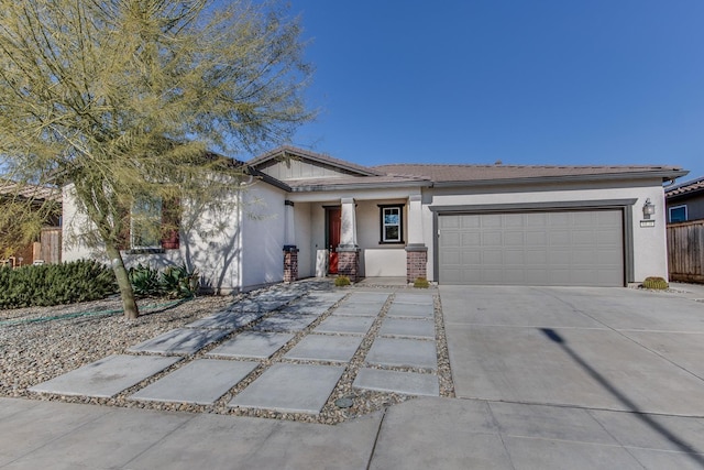 single story home with stucco siding, concrete driveway, an attached garage, and fence