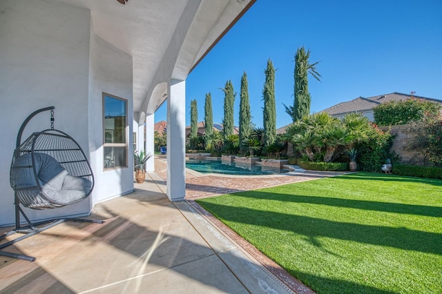 view of patio featuring a fenced in pool