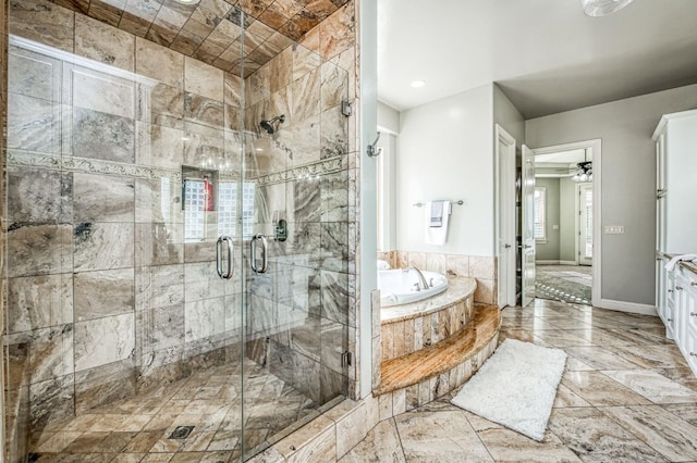 bathroom with ceiling fan and plus walk in shower