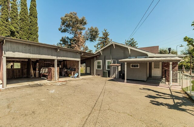 back of house with cooling unit