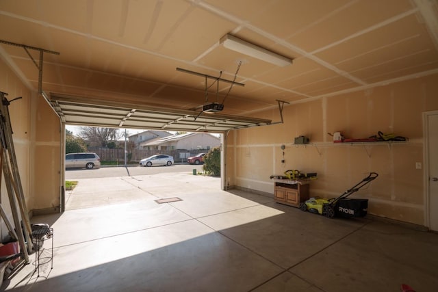 garage featuring a garage door opener