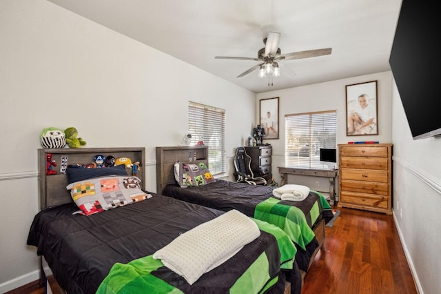 bedroom featuring ceiling fan and dark hardwood / wood-style floors