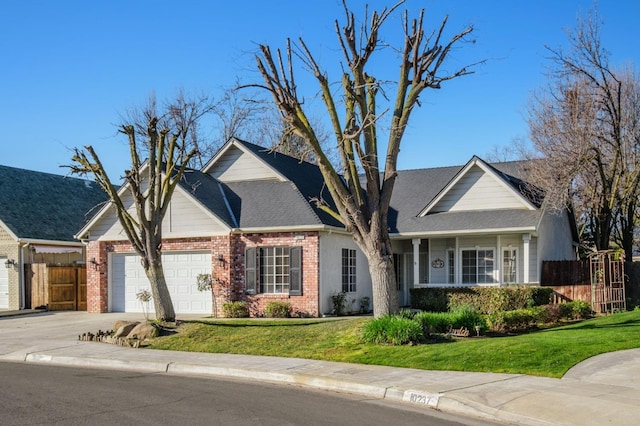 view of front of house with a garage and a front yard