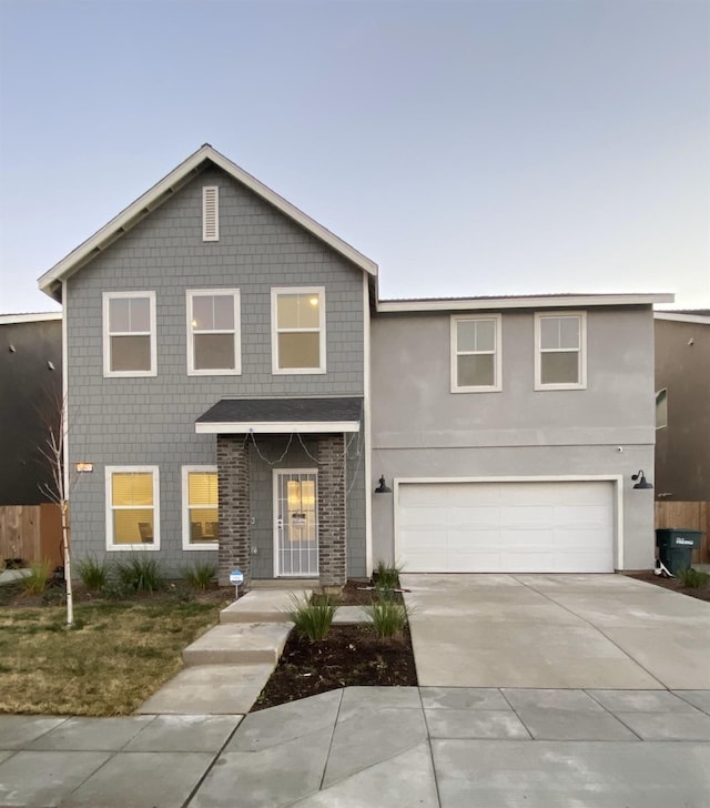 front of property featuring a garage