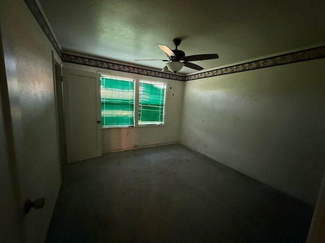 spare room with ceiling fan