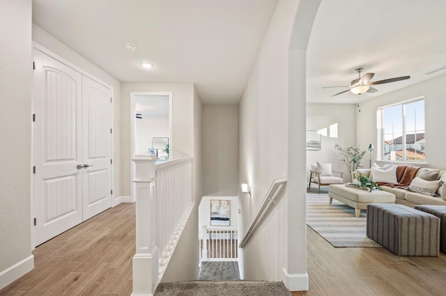 corridor featuring light hardwood / wood-style floors